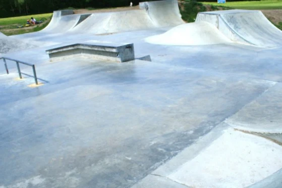 Concrete ramps, ledges and a rail at Woodhouse Lane Skatepark in Hedge End