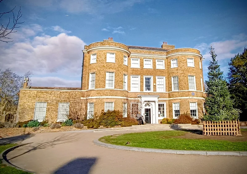 Venue: William Morris Gallery's brick exterior beside the curved path in Lloyd Park