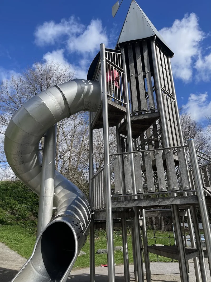 Timber climbing tower and enclosed slide at Abbey Lane Open Space