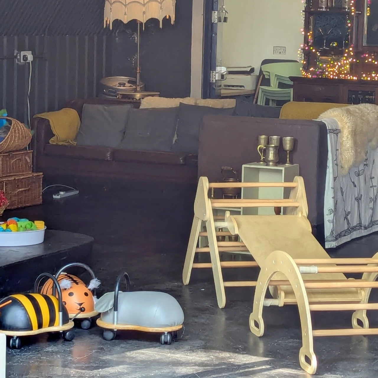 Ride-on toys, wooden play equipment and seating at Pint-Sized Playhouse